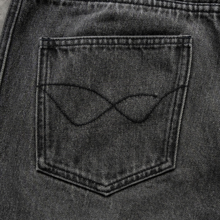 8W PANEL BAGGY JORTS BLACK — concrete back-pocket detail