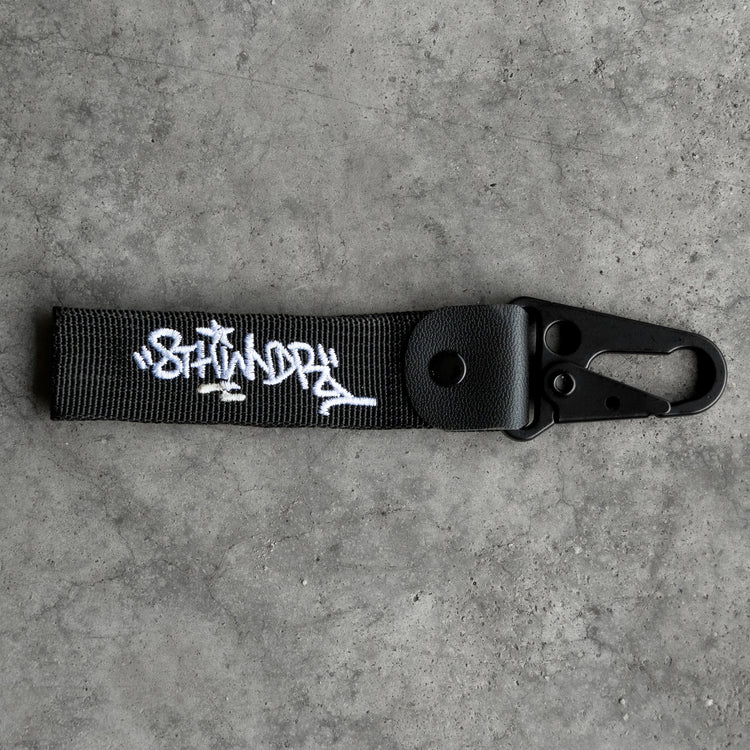 GRAFFITI LOGO FLIGHT TAG BLACK