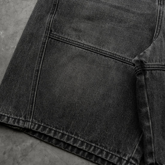 8W PANEL BAGGY JORTS BLACK — concrete front detail