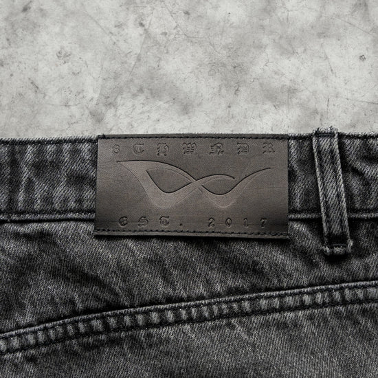 8W PANEL BAGGY JORTS BLACK — concrete construction detail