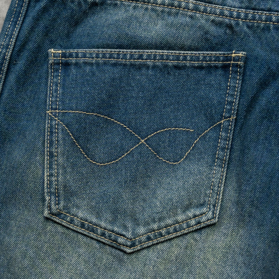 8W PANEL BAGGY JORTS BLUE — concrete back-pocket detail