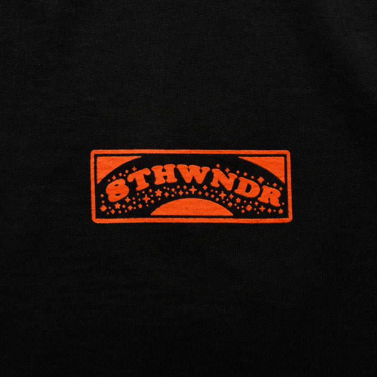 ONE WISH WONDER TEE BLACK — concrete front design close-up