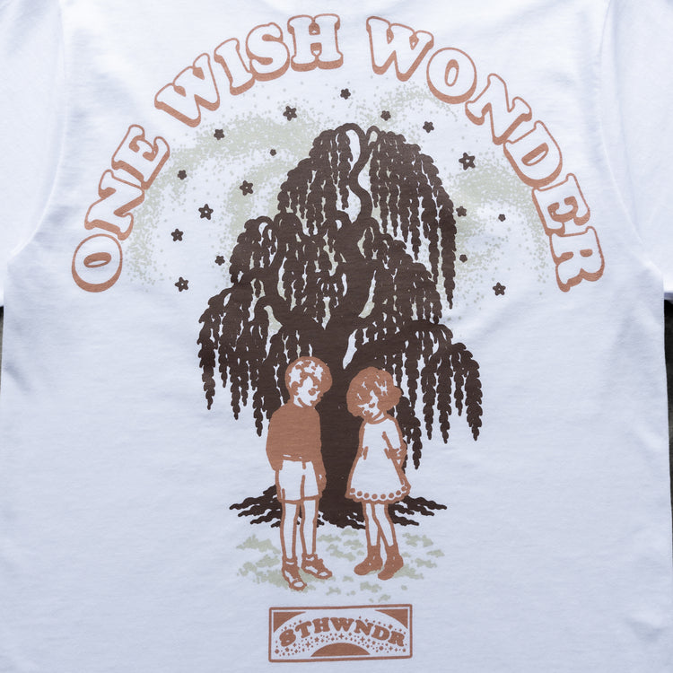 ONE WISH WONDER TEE WHITE — concrete back design close-up